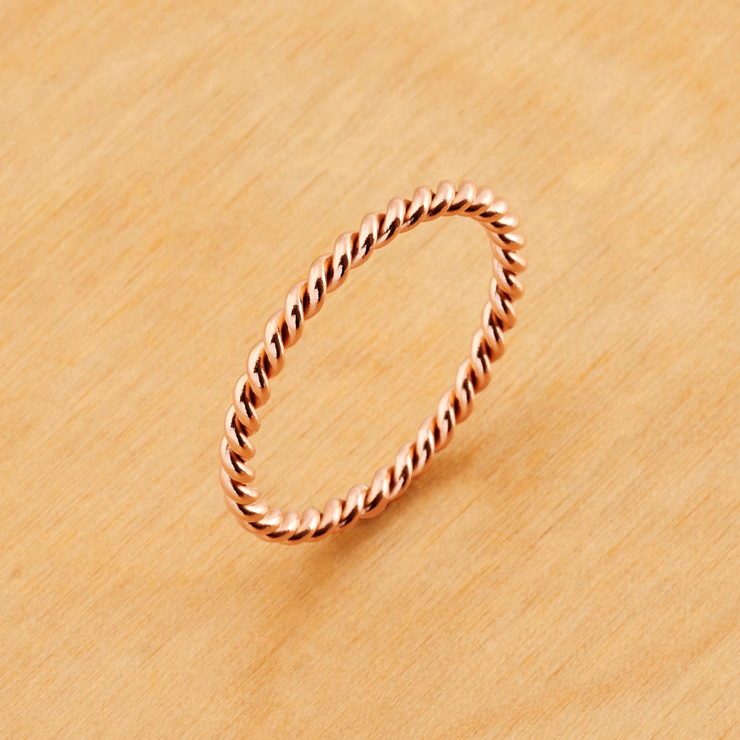 TI059 - Rose IP Titanium 2mm Thickness Twisted Design Ring